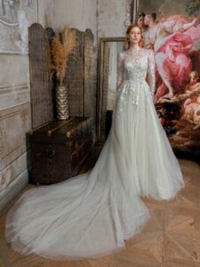 High-neck A-line wedding dress with long sleeves and floral embroidery; available in mint-powder, ivory