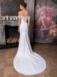 Simple fit and flare wedding gown with an off-the-shoulder sequinned lace decor