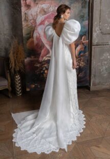 Style #2323L, voluminous sleeve fit and flare wedding dress with cape straps; available in ivory