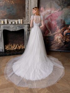Cap sleeve A-line wedding dress with plunging V-neckline