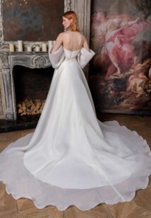 Style #2326L, off-the-shoulder A-line wedding dress with a draped bustier bodice; available in ivory