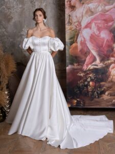 Off-the-shoulder A-line wedding dress with short puff sleeves and pockets