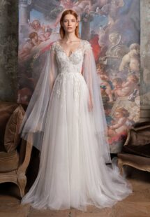Style #2328L, V-neck A-line wedding gown with cape sleeves and floral embroidery; available in ivory