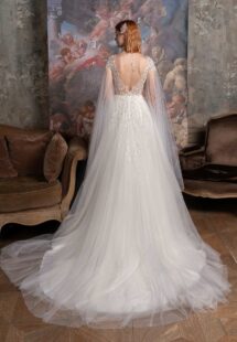 Style #2328L, V-neck A-line wedding gown with cape sleeves and floral embroidery; available in ivory