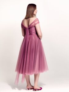 Style #742а, tulle A-line cocktail dress with off-the-shoulder straps, pleated corset and beaded illusion neckline; available in midi or maxi length; in pink, purple, blue, cherry, powder pink, black or ivory