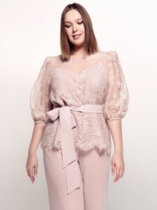 Style #744-4, two-piece evening set with 3/4 sleeve lace blouse and chiffon pants; available in powder pink, black or ivory