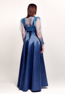 Style #745, square neck evening gown with thick straps, corset back, and removable long-sleeve bolero with floral decor; available in steel-dark blue, black, eggplant, crimson or ivory