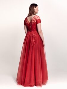 Style #746а, short sleeve A-line evening dress with illusion off-the-shoulder neckline, lace embroidery and tulle skirt; available in midi or maxi length; in cherry, powder pink, purple or black