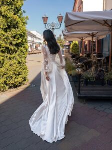 Long-sleeved wedding dress with butterfly decor; available in ivory, ivory-peach