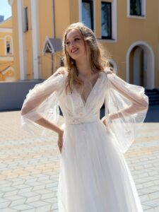 Tulle A-line wedding dress with V-neck and sleeves