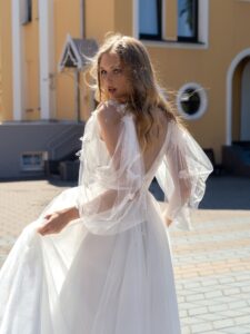 Tulle A-line wedding dress with V-neck and sleeves
