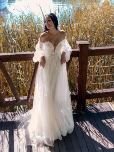 A-line wedding dress with 3D butterfly decor and detached bishop sleeves