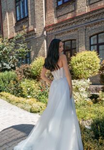 Style #15011, strapless A-line wedding dress with a bustier bodice and floral applique; available in ivory