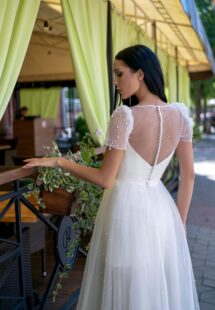 Style #15014, short A-line wedding dress with pearls; available in ivory