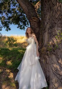 Style #15015, organza A-line wedding dress with tiered skirt and ruffles; available in ivory