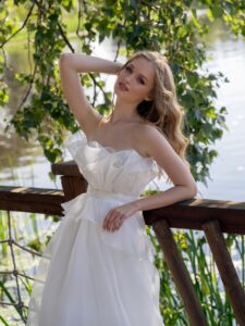 Organza A-line wedding dress with tiered skirt and ruffles