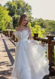 Style #15015, organza A-line wedding dress with tiered skirt and ruffles; available in ivory