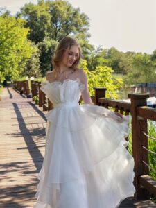Organza A-line wedding dress with tiered skirt and ruffles