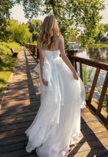 Style #15015, organza A-line wedding dress with tiered skirt and ruffles; available in ivory