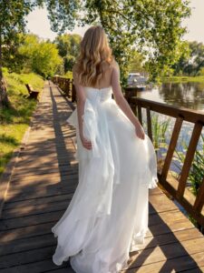 Organza A-line wedding dress with tiered skirt and ruffles