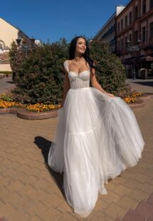 Style #15017, A-line wedding dress with bustier style corset and tiered skirt; available in ivory