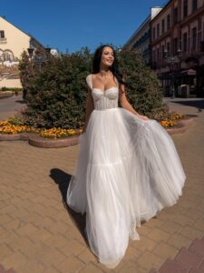 A-line wedding dress with bustier style corset and tiered skirt