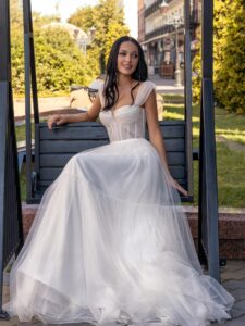 A-line wedding dress with bustier style corset and tiered skirt