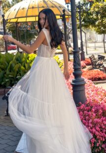 Style #15017, A-line wedding dress with bustier style corset and tiered skirt; available in ivory