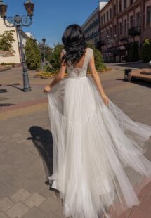 Style #15017, A-line wedding dress with bustier style corset and tiered skirt; available in ivory