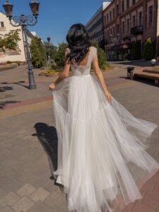 A-line wedding dress with bustier style corset and tiered skirt