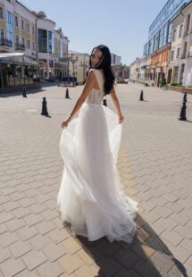 Style #15017, A-line wedding dress with bustier style corset and tiered skirt; available in ivory