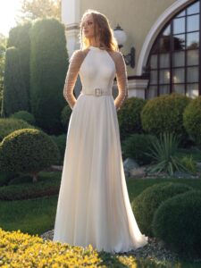 Halter neck chiffon wedding gown with long pleated sleeves