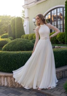 Style #15018, halter neck chiffon wedding gown with long pleated sleeves; available in ivory