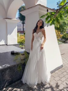 A-line wedding dress with illusion sweetheart neckline and lace embroidery