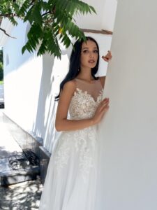 A-line wedding dress with illusion sweetheart neckline and lace embroidery