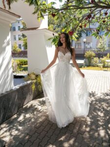 A-line wedding dress with illusion sweetheart neckline and lace embroidery