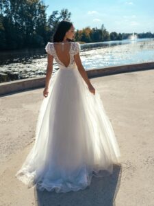 V-neck A-line wedding dress with cap sleeves and open back