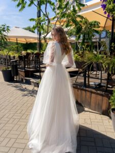 V-neck ball gown wedding dress with long balloon sleeves