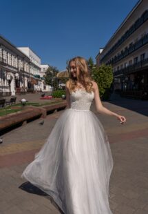 Style #15025, A-line wedding dress with illusion neckline lace bodice and tulle skirt; available in ivory