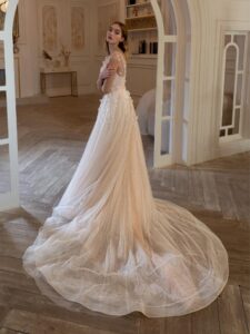 A-line wedding dress with 3D floral decor; available in peach, cream