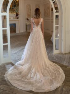 A-line wedding dress with 3D floral decor; available in peach, cream
