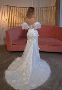 Style #2401L, strapless fit and flare wedding dress with long off-the-shoulder sleeves; available in ivory