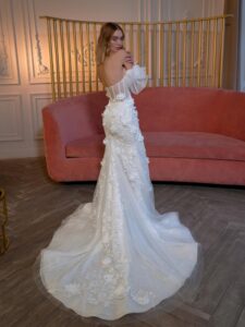 Strapless fit and flare wedding dress with long off-the-shoulder sleeves
