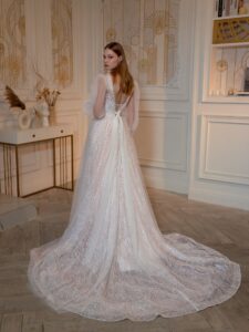 Sequinned A-line wedding dress with detachable long-sleeved overlay blouse; available in peach, ivory