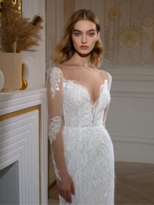 Beaded fit and flare wedding dress with long sleeves