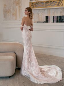 Fit and flare wedding gown with floral embroidery; available in ivory-powder, ivory