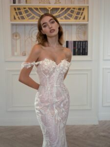 Fit and flare wedding gown with floral embroidery; available in ivory-powder, ivory