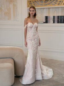 Fit and flare wedding gown with floral embroidery; available in ivory-powder, ivory
