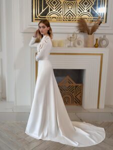 Plain wedding dress with long sleeves and open back