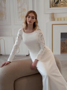 Plain wedding dress with long sleeves and open back